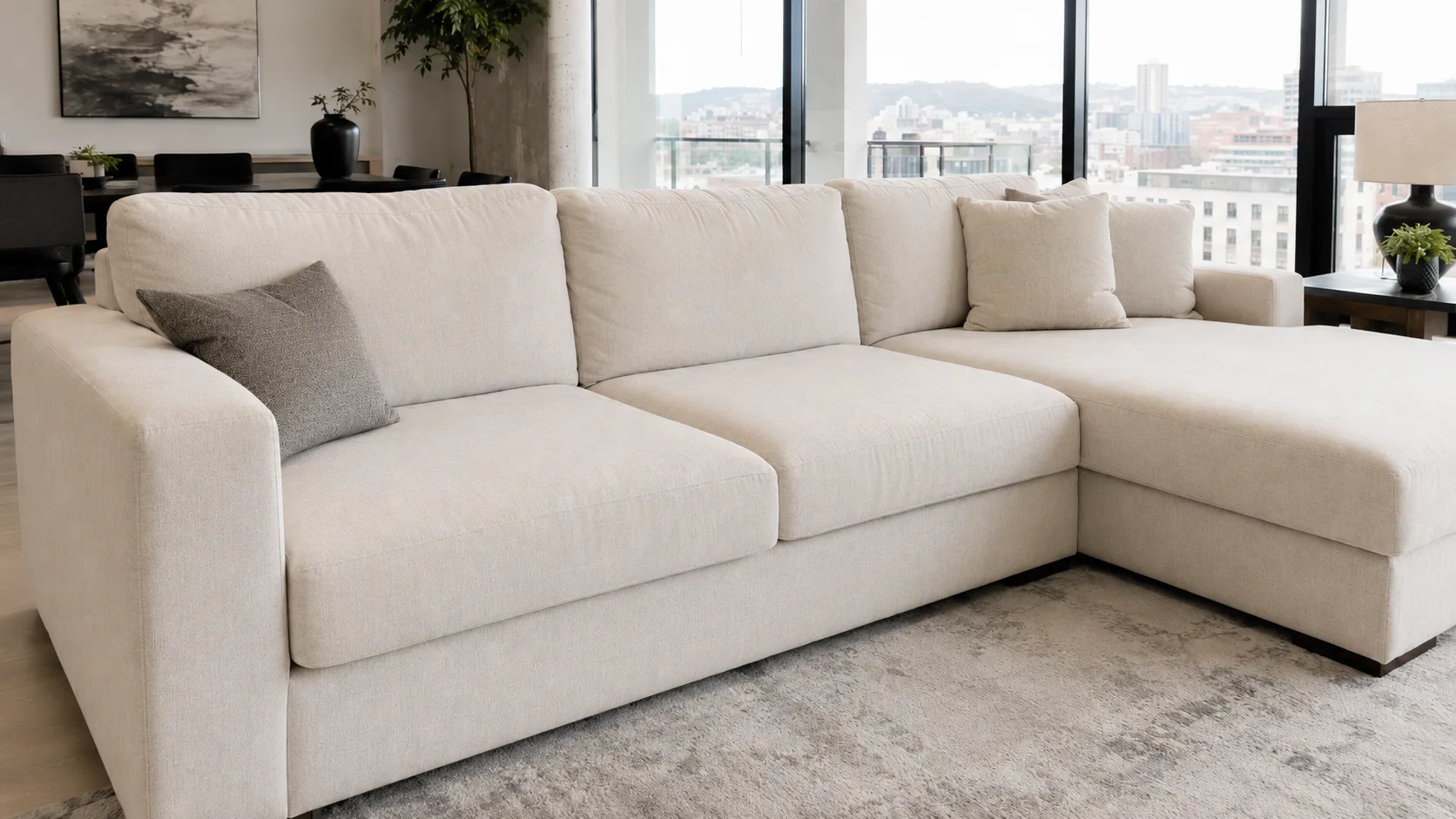 Sofa before professional cleaning — showing stains and general soiling