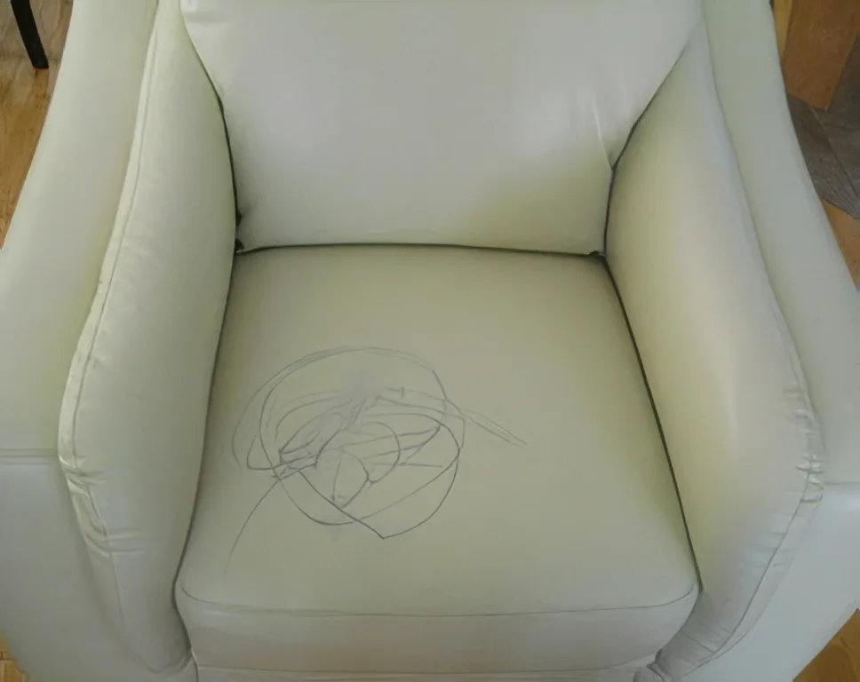 Leather sofa after Maqsim repair — restored finish and even colour